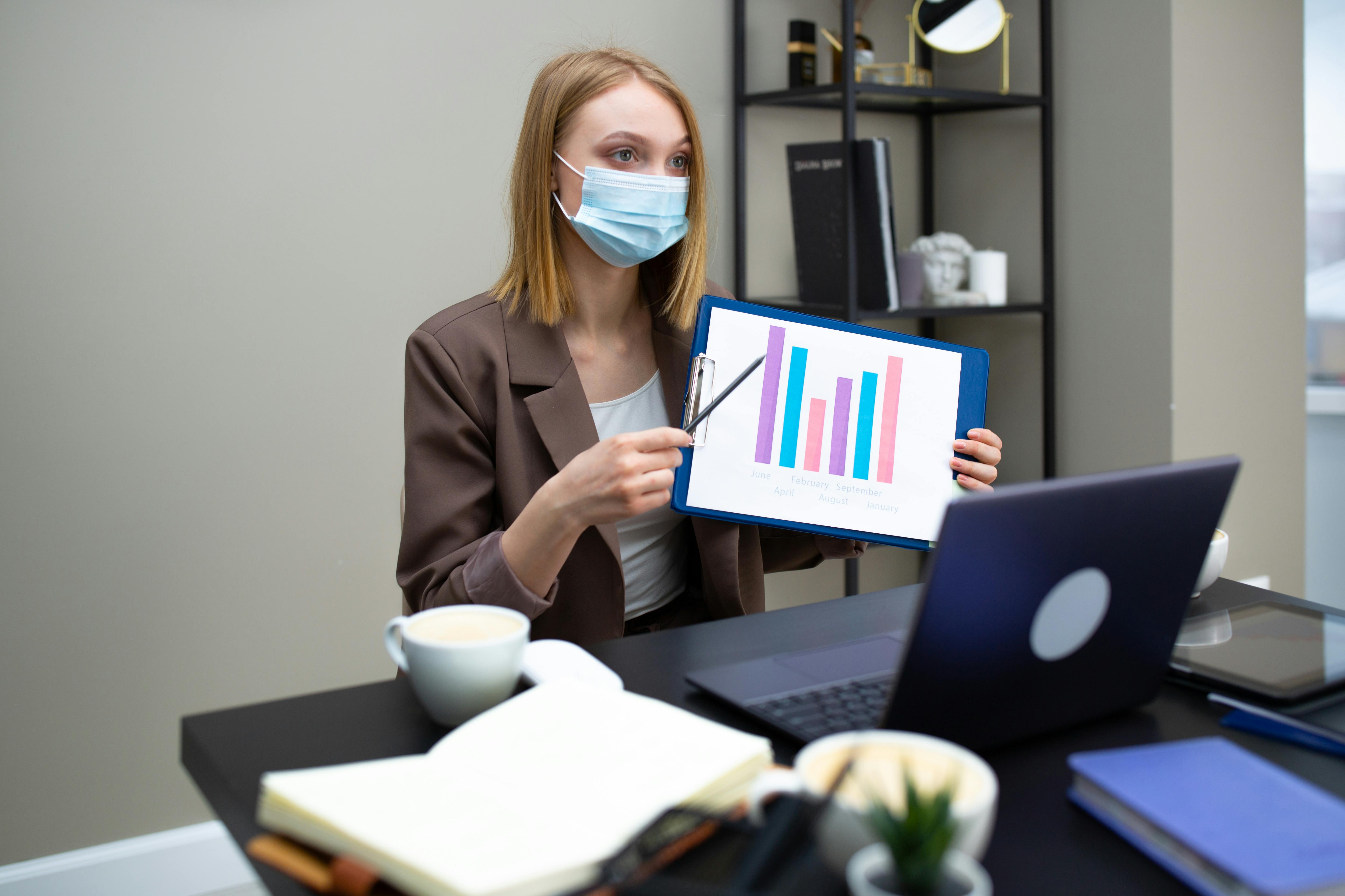 women holding charts