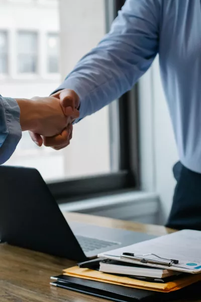 Man and woman shaking hands